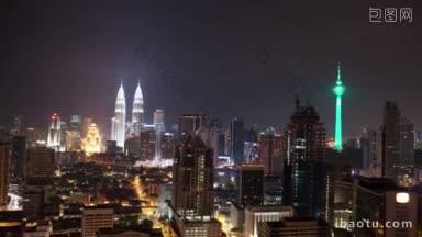 时间<strong>间隔</strong>镜头在夜晚的马来西亚首都吉隆坡，摩天大楼被照亮